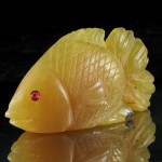 KG-005 Hand carved Genuine Gemstone Fire Opal in Fish Shape Statue with 2 Genuine Red Ruby Inlaid in The Eyes